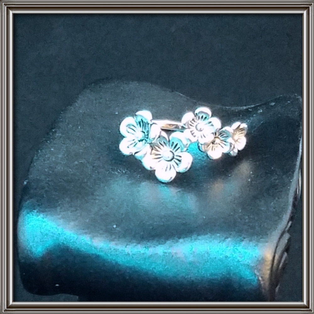Beautiful Plumeria .925 sterling silver ring.